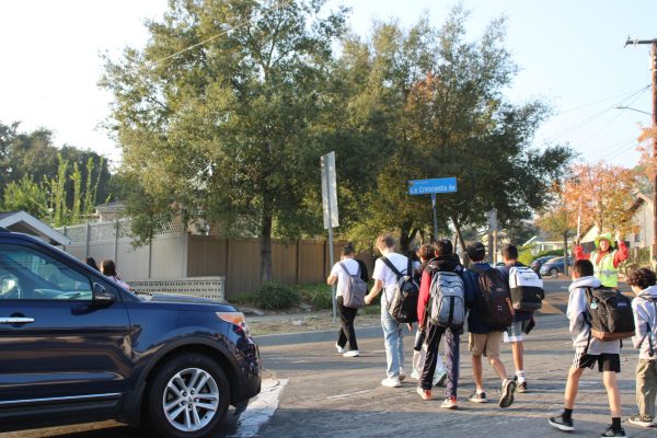 Rosemont students walk across Los Olivos without crosswalk.